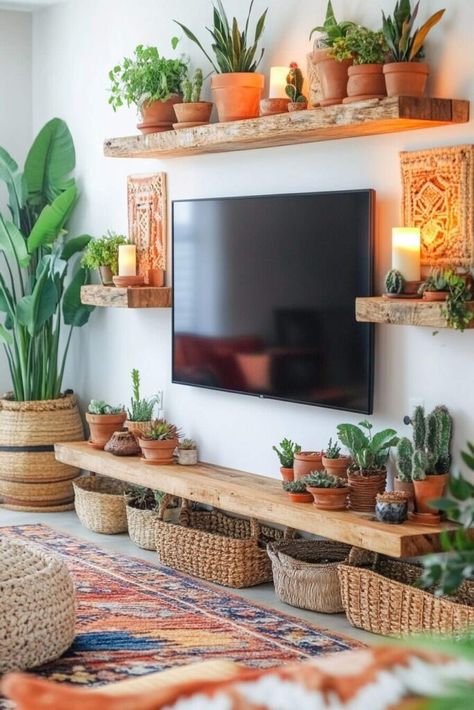 20 Boho TV Wall Decor Ideas to Bring Cozy, Creative Vibes to Your Home Shelf For Tv On Wall, Picture Shelf Plants, Boho Living Room Entertainment Center, Styling Tv Console Shelves, Boho Style Tv Unit, Colorful Boho House Decor, Boho Entertainment Center Ideas, Mounted Tv Stand Decor, Plants On Mantle With Tv