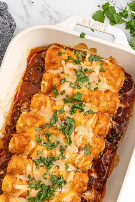 This easy ground beef enchiladas recipe takes simple ingredients and transforms them into delicious enchiladas smothered in sauce and cheese. Beef Enchiladas With Red Sauce, Sourcream Chicken Enchiladas, Easy Ground Beef Enchiladas, Spicy Enchiladas, Enchiladas With Red Sauce, Mexican Ground Beef Casserole, Beef Enchiladas Recipe, Nachos Recipe Beef, Easy Beef Enchiladas