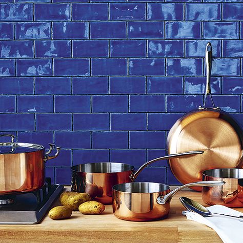 Copper Kitchen Cookware And Cobalt Blue Subway Tiled Backsplash Blue And Copper Kitchen, Cobalt Blue Kitchens, Copper Kitchen Accents, Blue Kitchen Tiles, Copper Kitchen Accessories, Blue Subway Tile, Blue Backsplash, Big Kitchen, Subway Tiles