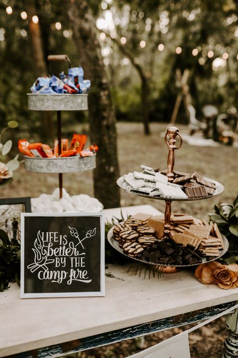 Rustic Smores Bar Wedding, Campfire Bridal Shower Theme, Summer Camp Style Wedding, Campfire Wedding Ideas, S’mores Wedding Bar Ideas, Camping Theme Wedding Receptions, Wedding Camping Theme, Fall Camp Wedding, Campfire Wedding Reception