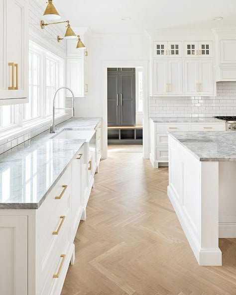 White kitchen with wood herringbone floors, designed by The Fox Group #kitchenislands Treehouse Kitchen, Gold Lamps, Kitchen London, Beautiful White Kitchens, Cottage Kitchen Design, Herringbone Wood Floor, Herringbone Wood, White Kitchen Island, Light Wood Floors