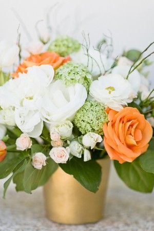 Gorgeous fall flowers in a gold planter. White And Orange Floral Arrangements, Orange And White Flower Arrangements, Orange Flower Arrangements, Orange Floral Arrangements, Orange Centerpieces, Orange And White Flowers, Vase Rose, Centerpiece Vase, Gold Vase