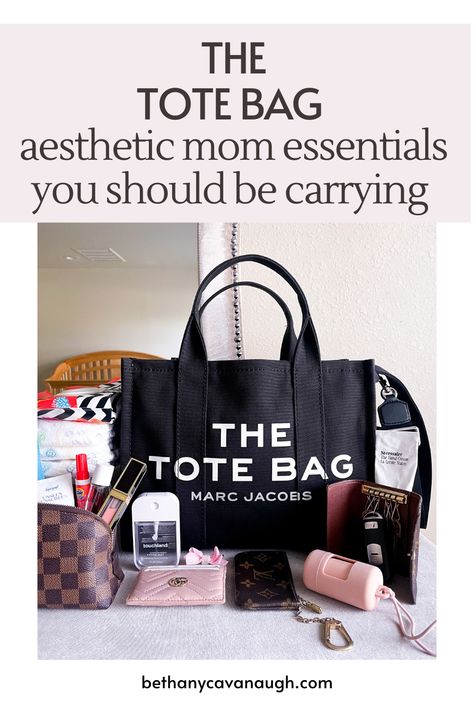 The Tote Bag by Marc Jacobs surrounded by diaper bag essentials, including diapers, wipes dispenser, hand sanitizer, card holder, bag dispenser, key holder, hand lotion, lip gloss, Tide pen, sunscreen. Mom Bags Everyday, The Tote Bag Aesthetic, Mom Purse, Aesthetic Mom, Mom Purses, Mom Essentials, Mom Bag, Mom Tote Bag, Tote Bag Aesthetic