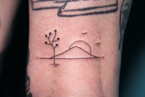 Permanent Friends ™️ on Instagram: “Joshua Tree sunset on the back of the knee for Rachel. By @blackscraps done at @permanent.friends.” Fine Line Joshua Tree Tattoo, Small Joshua Tree Tattoo, Joshua Tattoo, Joshua Tree Tattoo, Joshua Tree Sunset, Cactus Tattoos, Wind Tattoo, Friends Tattoo, Sunset Tattoos