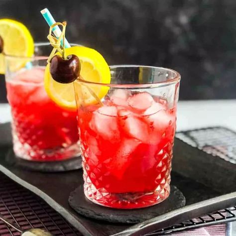 This Cherry Vodka Sour uses fresh cherries and a homemade sour mix to give you a lightly sweetened, easy sipping cocktail. You’ll love the fresh taste of this delicious twist on a classic vodka sour cocktail. Even more, you’ll love how easy it is to mix up a refreshing summertime cocktail. It’s the perfect drink for those warm summer evenings. You’re definitely going to want to share this one with friends.A traditional vodka sour cocktail includes an egg white for an extra frothy top… Vodka Sour Recipe, Cherry Vodka Sour, Homemade Sour Mix, Blood Orange Vodka, Cherry Whiskey, Vodka Sour, Drink With Friends, Summertime Cocktail, Lemon Garlic Pasta