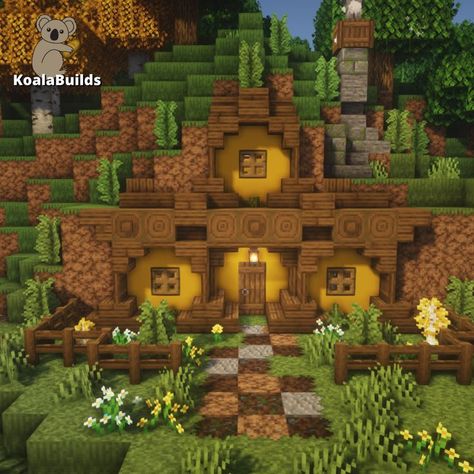 Tap to watch more of my builds & their tutorials! Minecraft Hobbit Hole Entrance, Spruce Wood House Minecraft, Hobit Houses Minecraft, Hobbit Minecraft, Minecraft Hobbit Hole, Cottage Core Minecraft, Hobbit Village, Cottage Core Minecraft House, Minecraft Tutorials