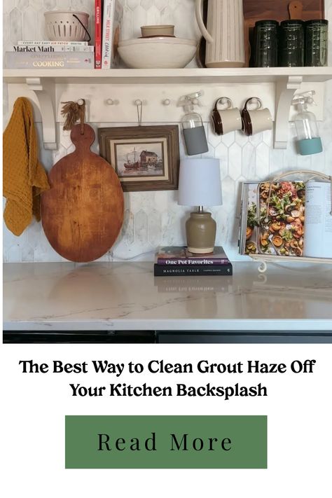 Organized kitchen shelf with books, jars, cutting board, and a lamp above a marble countertop. Best Way To Clean Grout, How To Remove Grout, Install Backsplash, Clean Grout, Marble Backsplash Kitchen, Composite Fencing, Magnolia Table, Old Towels, Vinegar And Water