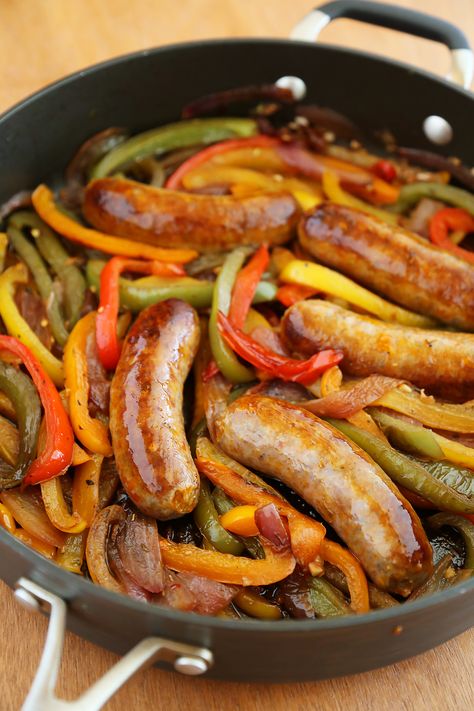 Skillet Italian Sausage, Peppers and Onions - Easy comfort food for weeknights & game days! Serve over pasta, polenta, potatoes or on warm crusty rolls. Thecomfortofcooking.com Sausages And Peppers, Sausage Peppers And Onions, Sausage Recipes For Dinner, Sausage Dinner, Italian Sausage Recipes, Resep Salad, Sausage Dishes, Crock Pot Recipes, Fair Food