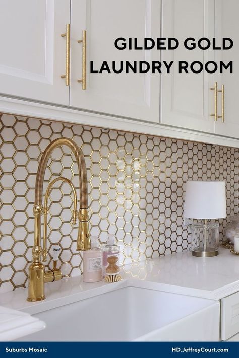 White laundry room sink and countertop with gold hardware showcasing the white marble hexagons with gold metal outlines mosaic on the wall. Top Loader Laundry Room, Elegant Laundry Room, Tile Hexagon, White And Gold Wallpaper, Laundry Room Tile, White Laundry Rooms, Home Setup, Laundry Room Lighting, Laundry Room Wallpaper