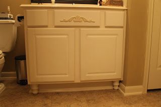 Texas Decor: Adding Furniture Legs To Bathroom Vanity  http://texasdecor.blogspot.com/ Builder Grade Cabinets, Curtains Or Shades, Pallet Deck Diy, Wooden Magazine Rack, Add A Bathroom, Fiberglass Shower, Texas Decor, Plastic Shower Curtain, Builder Grade