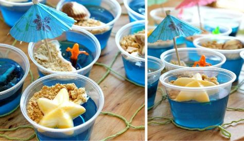 Under the sea party treats  blue jello, with cool whip topped with crushed graham crackers to make a beach! SO CUTE Rome Party, Sea Party Ideas, Blue Jello, Sea Birthday Party, Beach Themed Party, Beach Birthday, Sea Birthday, Under The Sea Party, Mermaid Birthday Party