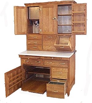 Hoosier Cabinet. So much useful storage here! I love pieces like this that are charming and SO functional. Vintage Kitchen Cabinets, Hoosier Cabinets, Hoosier Cabinet, Hutch Cabinet, Best Leather Sofa, Credenza Vintage, Moving Home, Toasters, Bedroom Furnishings