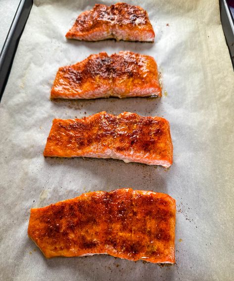 baked salmon on a sheet pan with parchment paper Baked Frozen Salmon Recipes Oven, Baked Fish In Parchment Paper, Baked Salmon In Parchment Paper, Salmon In Parchment Paper Recipes, Salmon In Parchment, Parchment Paper Salmon, Parchment Salmon, Salmon In Parchment Paper, Parchment Paper Recipes