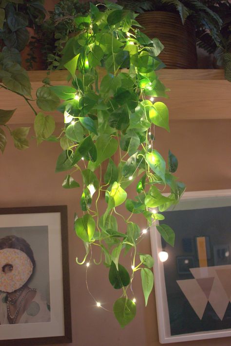 Fake Plants Decor Restaurant, Plants With Fairy Lights, Room Decor Flower Wall, Hanging Corner Plants, Plants House Decor, Nature Indoors Decor, Neurodivergent Home Decor, Home Decor Basement, Hanging Plants With Lights