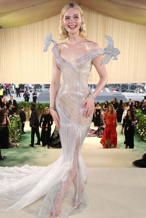 Elle Fanning's Balmain organza dress for the 2024 Met Gala looks like a fantastical design made of glass. See more wedding fashion trends from the 2024 Met Gala at the link. Drop Waist Gown, Met Gala Outfits, Met Gala Dresses, Met Gala Red Carpet, Chloe Sevigny, Fashion Fail, Gala Dresses, Elle Fanning, Red Carpet Looks