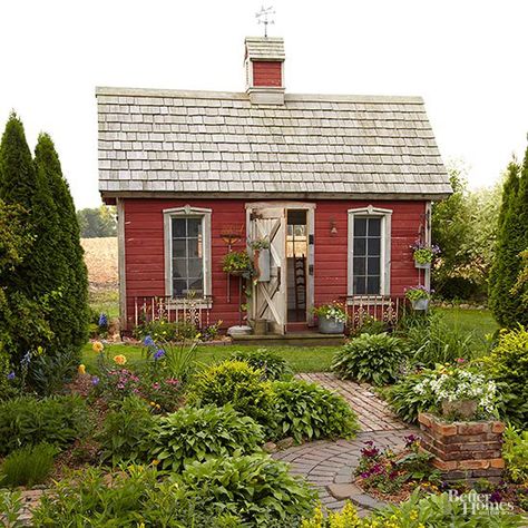 See our favorite garden sheds that are unique and adorable. These garden sheds are perfect for storage, entertaining or as a nice getaway. Get ideas here how you can create and landscape a garden shed in your backyard. Shed Playhouse, Cool Sheds, Salvaged Windows, Shed Landscaping, She Shed Ideas, Garden Shed Ideas, Shed Decor, Backyard Sheds, Backyard Shed