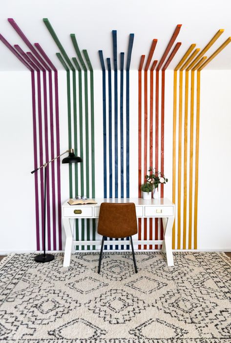 Looking for a rainbow nursery idea?! I did this easy and inexpensive accent wall in my homeschool room but this could also be an amazing colorful nursery accent wall! This project was simple and so beautiful! The entire wall was done with wood and paint! Striped Accent Walls, Striped Accent Wall, Stripe Wall, Room Accent Wall, Homeschool Room, Striped Walls, Nursery Colors, Wall Color, Wall Colors