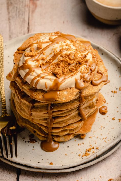 These Biscoff Pancakes are so quick and easy to make and are super fluffy! Perfect for Pancake Day, Fat Tuesday, Mardi Gras or any lazy brunch at the weekend! These fluffy flavourful pancakes are packed with white chocolate chips making them perfect for any special occasion and the ultimate dessert with Biscoff whipped cream resting on top! Don't forget to drizzle with some melted Biscoff for extra indulgence! YUM! | eatloveeats.com Biscoff Pancakes, Flavored Pancakes, Pancake Toppings, Biscoff Cookie Butter, Chocolate Pancakes, Pancake Day, Fluffy Pancakes, Fat Tuesday, Bakery Recipes