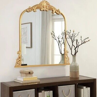 MirrorStart.com - Reflect Your Style The Azalea Park Filagree Wall Mirror is easy to maintain. Dust all non-mirror surfaces with a dry, soft cloth to prevent any dust from settling into the motifs. The mirrored surface can be cleaned with glass cleaner. Looking Mirror Designs Bedrooms, Bedroom Corner Mirror Decor, Mirrors Above Console Table, Foyer With Mirror, Mirrors Behind Nightstand Ideas, Mirror Behind Nightstand, Gold Antique Mirror, Mirror Over Fireplace, Gold Vanity Mirror