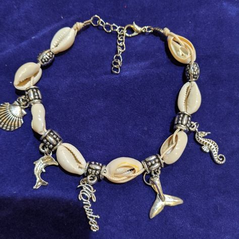 Add a touch of seaside elegance to your look with the ENUBEE Seaside Design Anklet. Featuring delicate shell beads and ocean-inspired charms, this anklet is perfect for beach days, casual outings, or just carrying a piece of the ocean with you. Pair it with your favorite summer outfit, and let your style shine! #EnubeeStyle #SeasideElegance #AnkleBraceletLove Seaside Design, Seashell Anklet, Ocean Inspired, Ocean Inspiration, Shell Beads, Beach Days, Ankle Bracelets, Beach Day, Summer Outfit