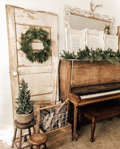 Stunning winter/Christmas decor with antique door and gorgeous piano! Piano Christmas Decorations, Piano Christmas Decor, Christmas Piano Decor, Piano Christmas, Office Goals, Piano Decor, Christmas Piano, Pine Garland, Colonial Christmas