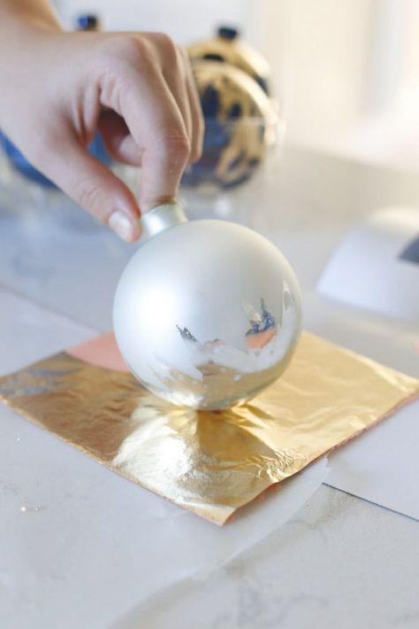 Gorgeous DIY Gold Leaf Ornaments | Sand and Sisal Silver And Gold Ornaments, Gold Leaf Crafts Easy Diy, Antique Christmas Ornaments Diy, Diy Gold Ornaments Christmas, Do It Yourself Christmas Ornaments, Diy Glass Ornaments Christmas, Diy White Christmas Ornaments, Christmas Gold Decorations, Diy Painted Christmas Ornaments