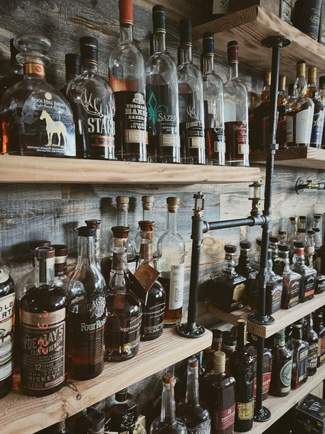 Wall of hundred bottles of whiskey. Collection of whiskey on wooden wall industrial wall Bourbon Bottle Display Ideas, Bar Liquor Display, Whisky Shelves, Whiskey Shelf, Liquor Shelves, Whiskey Display, Whiskey Shelf Ideas, Whiskey Shelves Display, Whiskey Collection