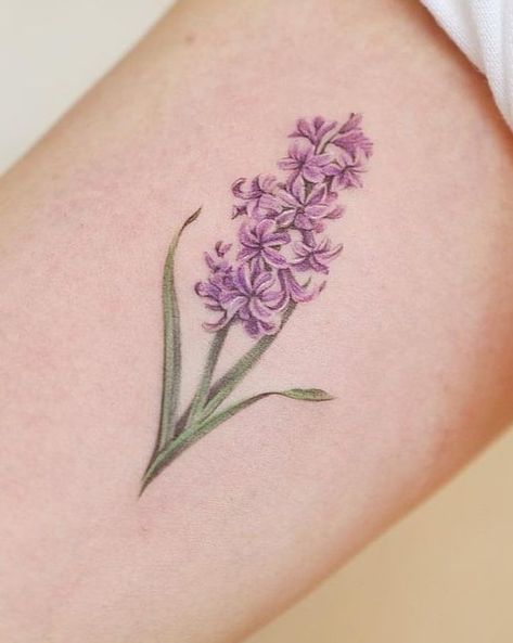 Hyacinth Tattoo, Purple Flower Tattoo, Purple Flower Tattoos, Tattoo Symbolism, Lilac Tattoo, Purple Tattoos, Tattoo For Boyfriend, Lady Bug Tattoo, Tattoo Meanings