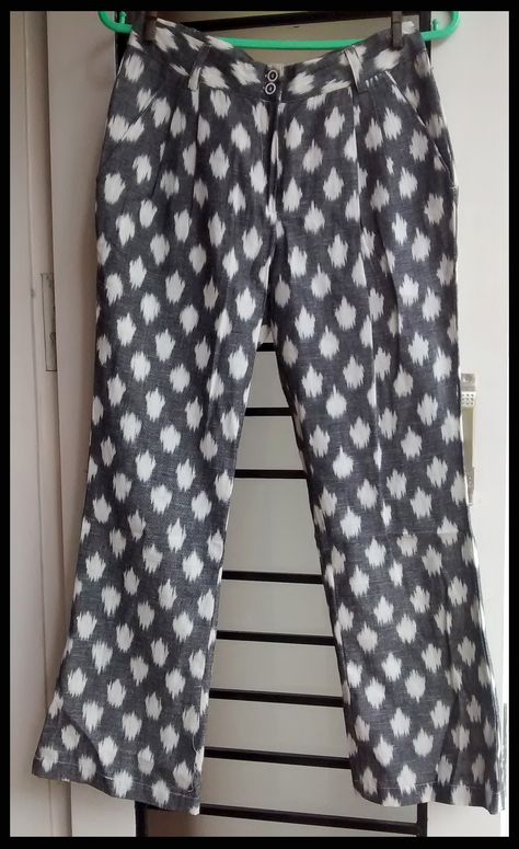 grey ikat blox pleated ankle length trousers. Ikat Pants Outfit, Elegant Homewear, Ikat Pants, Ikkat Pattern, Plazzo Designs, Plain Kurti Designs, Salwar Suit Neck Designs, Formal Pants Women, Elegant Shirt Dress