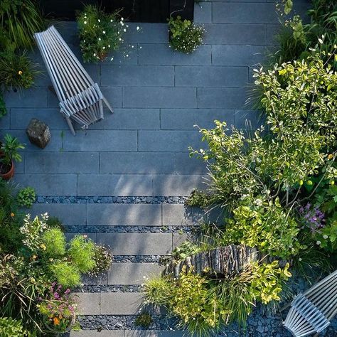 Stefano Marinaz | UK - NL on Instagram: "🌿 Discover our urban garden oasis bathed in sunlight! 🌞 Measuring 20 x 6 meters, this tranquil haven is nestled between the rear facade of the house and a chic black timber fence, creating a symphony of design and nature.  This was one of our earliest projects in the Netherlands, built two years ago for our wonderful client, Marianne. @urbanwildscape   The exquisite lushness of this bountiful planting is not only the result of our design intention but also Marianne's dedicated effort in observing and guiding its evolution to maturity.  The naturalistic aspect of our planting schemes encourages direct engagement with the garden, reducing the need for constant external aftercare.  A central play area takes the spotlight, enveloped by lush, naturalis Stefano Marinaz Garden, Stefano Marinaz, Timber Fence, Planting Schemes, Timber Fencing, Garden Oasis, House Landscape, Private Garden, Back Garden