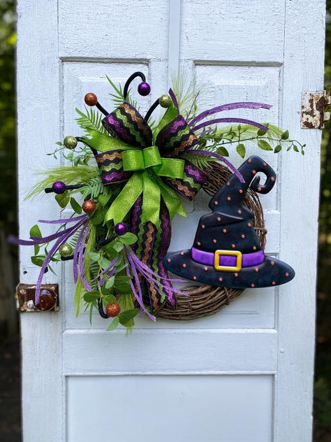 This cute and whimsical Halloween witch hat wreath will be a fun addition to your front door for all your Trick-or-Treater's! Mesh Witch Hat Wreath, Grapevine Halloween Wreath, Homemade Wreaths Diy, Halloween Grapevine Wreath, Halloween Wreaths For Front Door, Halloween Cooking, Halloween Witch Hat Wreath, Witch Hat Wreath, Halloween Front Door Decorations