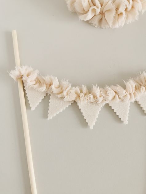 Cake topper made from felt triangles and muslin fringes. Handmade product for perfect photoshoot. Felt Party Hat, Vintage First Birthday, 1st Birthday Decor, Photoshoot Party, Cake Bunting, Princess Hat, Cake Banner Topper, Birthday Party Hats, Mini Party