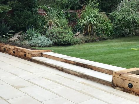 Large porcelain patio, oak sleeper retaining walls and new lawn in Sutton - Modern - Garden - Surrey - by Ayegardening Ltd | Houzz Oak Sleepers Retaining Wall, Sleepers Retaining Wall, Lawn Retaining Wall, Curved Sleeper Wall, Patio And Sleepers, Oak Sleeper Retaining Wall, Sleeper Wall Garden, Sleeper Steps Garden, Sleeper Steps