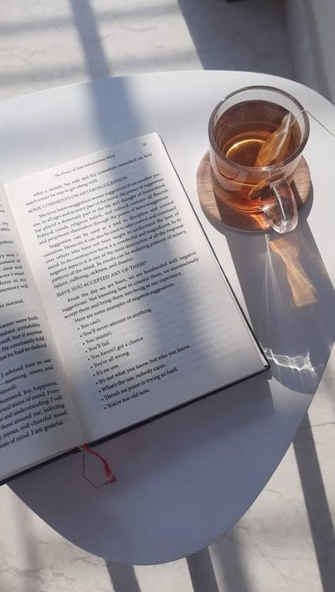 Golden hour book reading with some green tea Green Tea Instagram Story Ideas, Tea And Book Aesthetic, Book And Tea Aesthetic, Books And Tea Aesthetic, Tea And Books Aesthetic, Drinking Tea Aesthetic, 2025 Habits, Green Tea Aesthetic, Tea And Reading