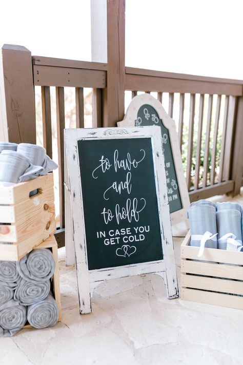 | wedding ceremony blanket sign | "to have and to hold in case you get cold" | modern rustic wedding signs | modern rustic wedding chalkboard sign | modern rustic wedding ceremony decorations | winter wedding ceremony | photo taken at THE SPRINGS Event Venue. follow this pin to our website for more information, or to book your free tour! SPRINGS location:  Stone Hall in McKinney, TX photographer:  Hannah Way Photography #weddingsign #weddingdecor #weddingdecorations #winterwedding #rusticwedding To Have And To Hold Blankets Wedding, Blankets Wedding Sign, To Have And To Hold In Case It Gets Cold Wedding Blankets, Blanket Wedding Sign, Blanket Station At Wedding, Blanket Sign For Wedding, Blankets At Wedding Ceremony, To Have And To Hold Incase You Get Cold, Wedding Blanket Sign