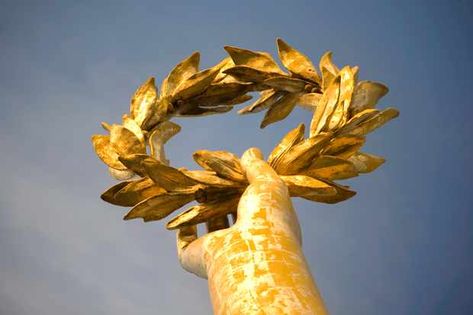 In Ancient Greece, victorious athletes were presented with laurel wreaths to wear. They were, and still are, signs of great accomplishment, unless you start resting on them... Roman Wreath, Olive Crown, Greece Party, Laurel Crown, Writing Contest, Greece Mythology, History Meaning, Olive Wreath, Son Of Zeus