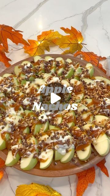 Linda | Make Life Extra | Fun Recipes + Home Finds + DIY on Instagram: "Apple nachos are the perfect dessert for all of your fall gatherings. 🍏🍎 Slice your apples. You can soak them in cold water with a tablespoon of salt to keep them from browning.  Arrange apple slices on a platter. Top with melted caramel, melted white chocolate, mini chocolate chips and nuts. The possibilities are endless so add your favorites. Enjoy!   #caramelapples #applenachos #appleseason #falldesserts #candyapples" Candy Apple Nachos, Fall Apple Nachos, Halloween Caramel Apple Slices, Caramel Dipped Apple Slices, Caramel Apple Platter, Fall Charcuterie Board Dessert, Apple Slices Snack, October Dessert Ideas, Fun Fruit Ideas For Kids