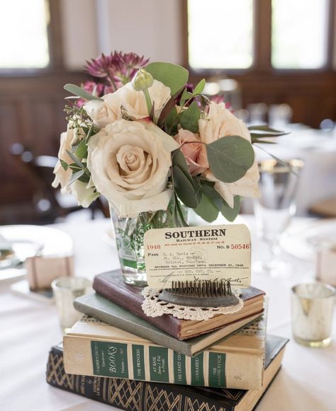 Book Pages Centerpiece, Book Floral Centerpieces, Book And Lantern Centerpieces, Books And Flowers Centerpiece, Book Table Centerpieces Wedding, Book Theme Quinceanera, Book Table Centerpieces, Book Centerpiece Wedding, Book Centerpiece Ideas