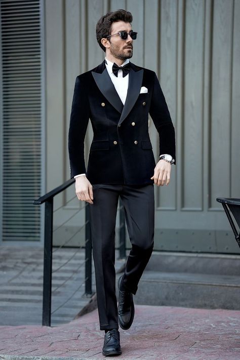 Radiate confidence in our Black Velvet Double Breasted Tuxedo 2-Piece, a classic yet modern ensemble that's sure to turn heads. Crafted from luxurious velvet, this tuxedo features a double-breasted jacket that exudes timeless charm and sophistication. Paired with tailored trousers, it offers a sleek and polished look.

#blacktuxedo #tuxedo #velvettuxedo #suit #suits #slimfit #menstyle #menfashion #fashioninspo #formalwear #menclothing #formalattire Double Breasted Suit Groom, Types Of Tuxedos For Men, Suit For Reception Men, Old Hollywood Tuxedo, Mens Wear Wedding Receptions, Reception Suits For Men, Mens Tuxedo Styles, Black Coat Pant For Men, Black Tuxedo For Men