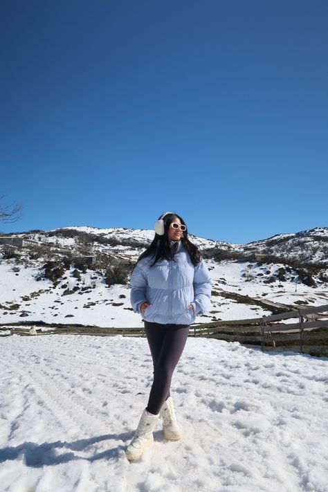 Asian girl standing, wearing white sunglasses, ear muffs, blue puffer jacket, leggings and white snow boots. She’s looking off the side as she is surrounded by a mountain of snow. Winter Aesthetic Outfit, Snow Winter Aesthetic, Snow Aesthetic, Snow Photoshoot, Snow Winter, Aesthetic Outfit, Winter Aesthetic, Winter Outfits, Instagram Photos