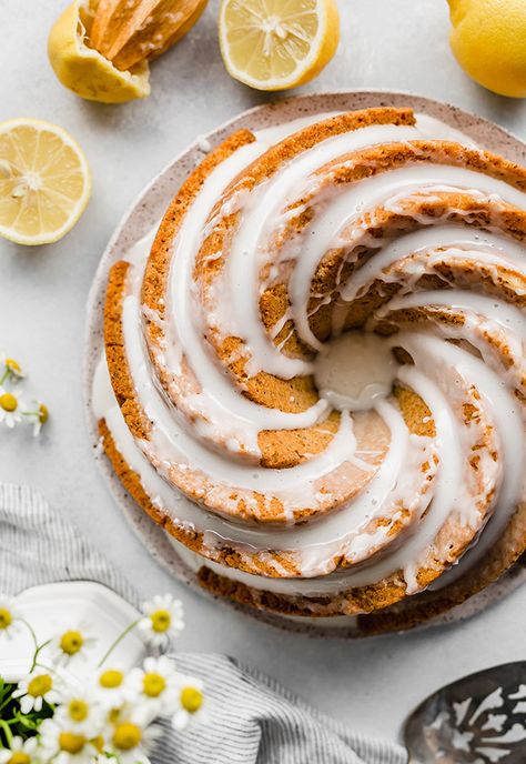 This lemon poppy seed cake is made from scratch, using sour cream, which makes the cake extra moist. Lemon Poppy Seed Bundt Cake Recipe, Lemon Poppy Seed Bundt Cake, Decorator Frosting Recipe, Poppy Seed Bundt Cake, Citrus Cake, Lemon Poppyseed Cake, Desserts Pictures, Poppy Seed Cake, Lemon Bundt Cake