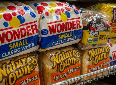 9 Worst Breads to Leave at the Store — Eat This Not That Low Calorie Bread, Grocery Store Shelves, Lose Abdominal Fat, Wonder Bread, Sprouted Bread, Loaves Of Bread, Sprouted Grains, Oatmeal Bread, Cinnamon Raisin Bread