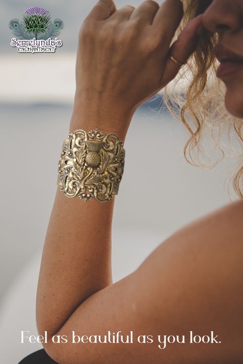 A lady in profile with her arm up, and on her arm is a wide gold color filigree bracelet with a Scottish thistle as the focal point. Thistle Jewellery, Statement Cuff Bracelet, Scottish Jewellery, Spring Valley, Brass Cuff, Scottish Thistle, Jewelry Statement, Kilt, Cuff Bracelet