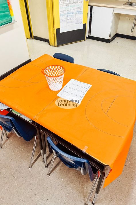 Discover how to create a basketball classroom transformation that will make reviewing reading skills engaging for 4th and 5th-grade students! This post provides ideas for setting up classroom transformation activities and incorporating different elements to keep students motivated. Following the tips shared you can create an exciting and effective learning environment your students will love. So, keep reading to discover how to transform your classroom into a basketball-themed wonderland! Basketball Classroom Transformation, Setting Up Classroom, Basketball Classroom, 21st Century Classroom Design, Classroom Transformation Ideas, Thanksgiving Reading Activities, Christmas Reading Activities, Reading Mini Lessons, Comprehension Games