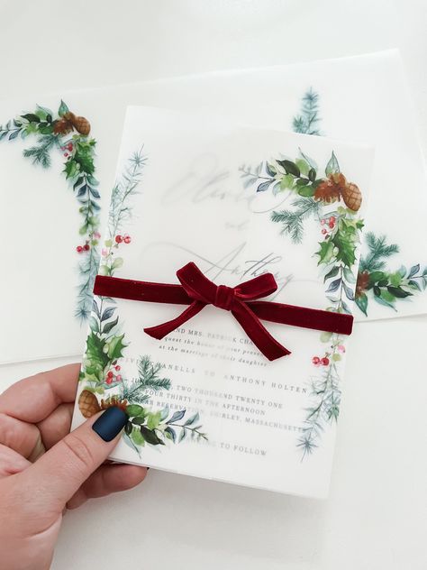 "Christmas wreath vellum wraps are perfect to spruce up your wedding invitations for the holiday season! These 5x7 evergreen clear vellum wraps will dress up your wedding invites and bring on the Holiday cheer! To use simply wrap around your invitation tightly and crease around your invitation, and then seal with a wax seal, sticker, or transparent tape (NOT INCLUDED). * Please note* The ribbon is for display purposes only and is NOT included with the wraps. . D E T A I L S . Each vellum jacket Christmas Invitations Wedding, Wedding Christmas Invitations, November Christmas Wedding, Christmas Theme Wedding Invitations, Christmas Wedding Jewelry, Christmas Mountain Wedding, Winter Christmas Wedding Ideas, Wedding Invitations Christmas Theme, Magical Winter Wedding