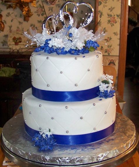 40th. anniversary cake done in royal blue., there wedding colors. Royal Blue Wedding Cake 2 Tier, Oscar Munoz, Half And Half Wedding Cakes, Wedding Cake Designs Blue, 40th Anniversary Cake, Wedding Cake Two Tier, Royal Blue Wedding Cakes, Royal Blue Cake, Fountain Wedding