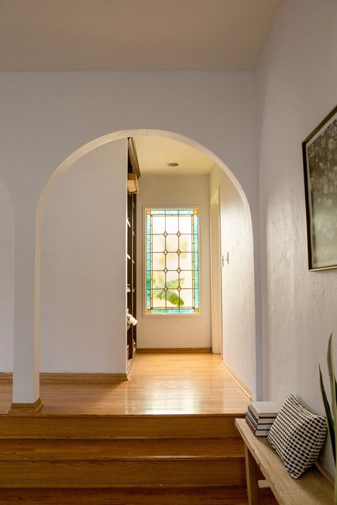 A Globally Inspired Spanish Colonial California Bungalow Entryway Window, Glass Entryway, Minimalist Beach House, Spanish Style Bathrooms, Mediterranean Home Interior, Transom Window, Apartment Vibes, California Bungalow, Decoration For Ganpati