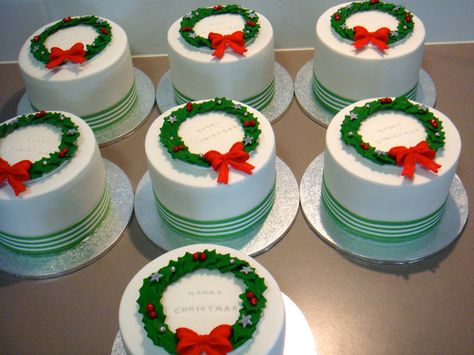 Mini Christmas Cakes - 4" mini Christmas cakes for friends. Dark rum soaked fruit cake with Marzipan and fondant. Holly leaves, bows & balls made from gumpaste. Mini Christmas Cakes, Christmas Cake Designs, New Year's Cake, Christmas Cake Decorations, Christmas Cake Recipes, Xmas Cake, Christmas Cakes, Mini Cake, Christmas Cupcakes