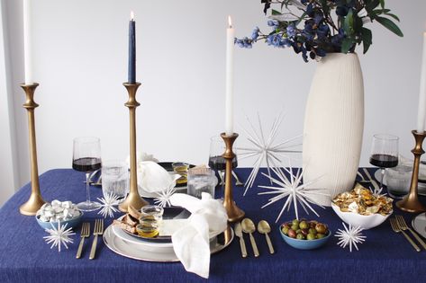 How to Host a Hanukkah Olive Oil Tasting - Hanukkah Tablescape Ideas Channukah Decorations, Hanukkah Tablescape, Hanukkah Table Setting, Olive Oil Tasting, Chanukah Party, Chanukah Decor, Blue Tablecloth, Hanukkah Decorations, Tablescape Ideas