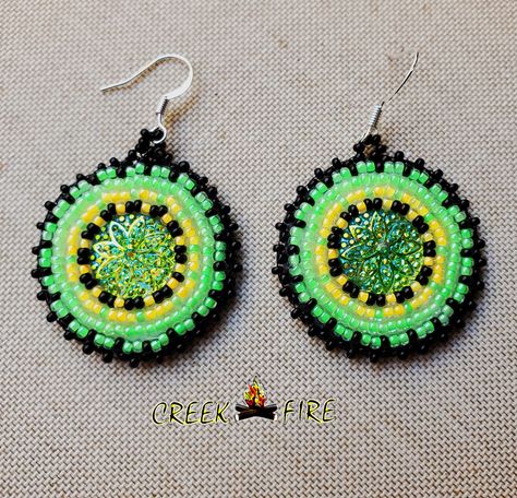 These are authentic Native American earrings, hand crafted by a member of the Muskogee Creek Tribe. Used in the handmade process are seed beads, acrylic cabochons and faux leather backing. The bead colors included in this pair are:  black, neon green and yellow seed beads. They measure 1 1/4 inches wide and 2 inches long. They have stainless steel hypo-allergenic  hooks ear post for pierced ears. Muskogee Creek, Creek Tribe, Beaded Earrings Native, Amazon River, Native American Earrings, Native American Beadwork, Beadwork Patterns, Native American Beading, Yellow Earrings